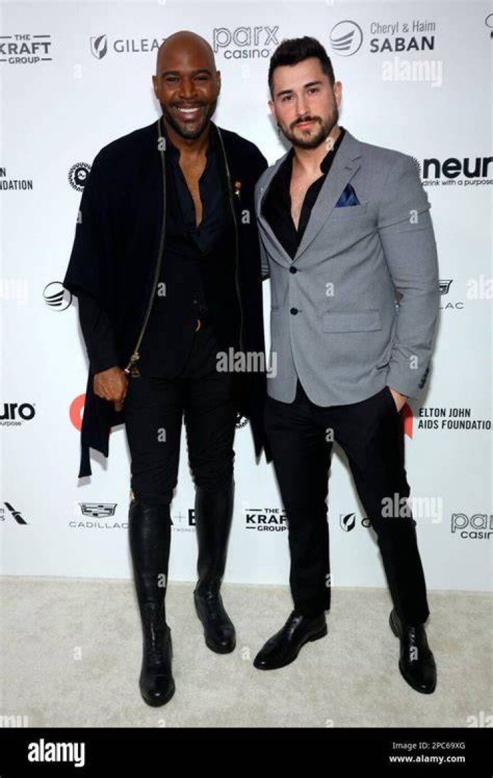 An Image of Carlos Medel and Karamo Brown