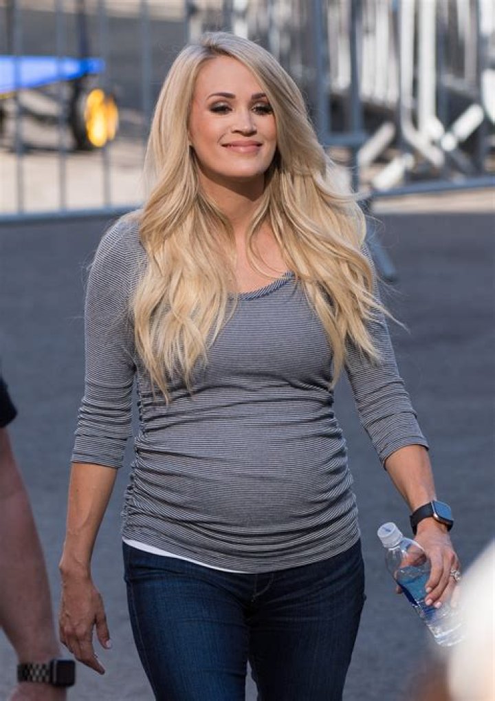 Carrie Underwood is pregnant, tells fans she is 'over the moon'