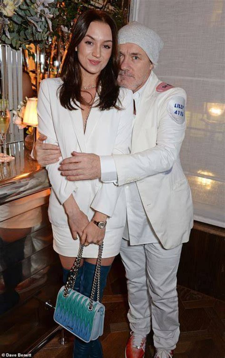 Damien Hirst and girlfriend Katie Keigh attend Star Wars The Force