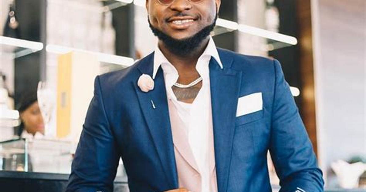 Davido Names Nigerian Business Magnate Captain Idahosa Wells Okunbo as His Godfather (Photo)