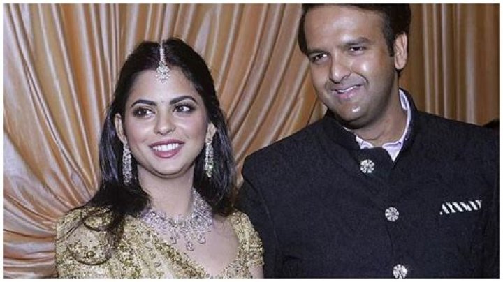 Isha Ambani and Anand Piramal arrive at their Mumbai home with their
