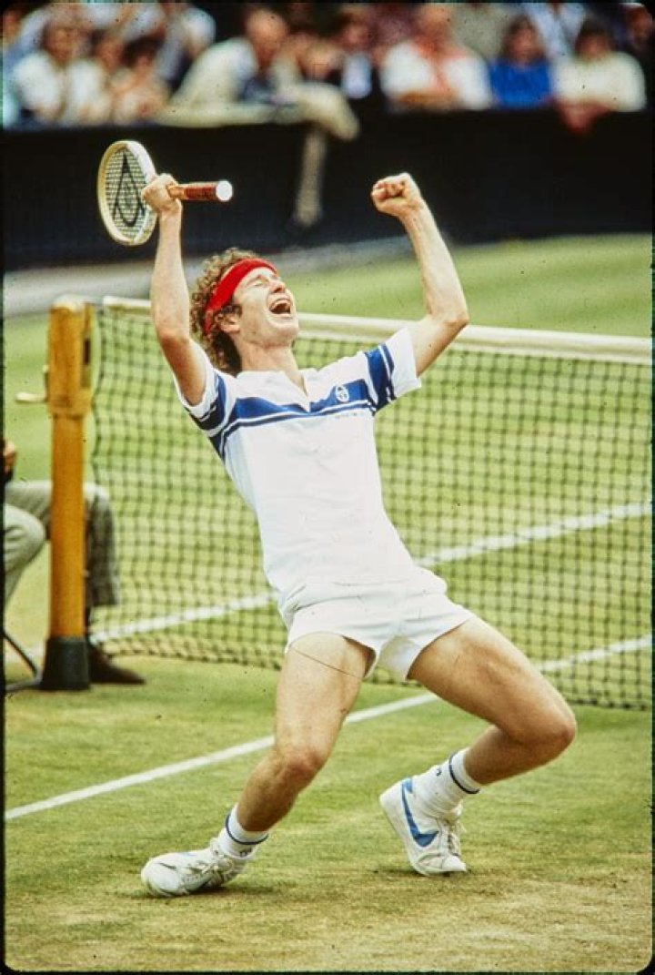 John McEnroe celebrating his first Wimbledon win in 1981