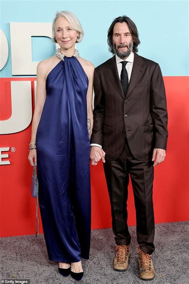 Keanu Reeves packs on PDA with girlfriend in rare redcarpet appearance