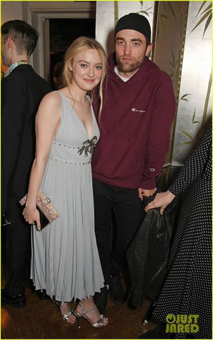 Luke and Dakota Fanning at the Golden Globes in Los Angeles. Luke