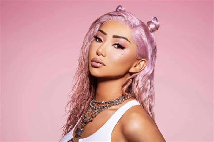 Nikita Dragun in a Pink Workout Ensemble Shops at Balenciaga in Los