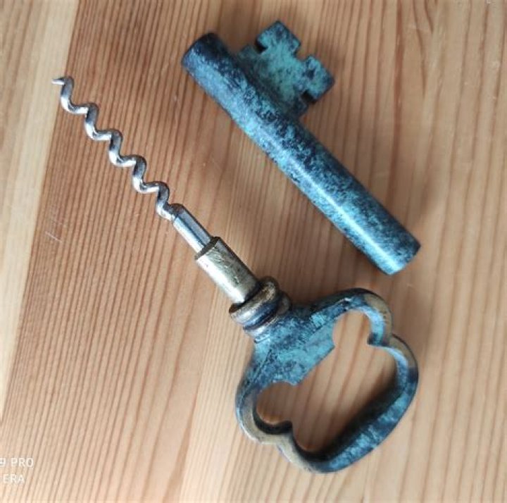 Old vintage German bottle opener "KonigPilsener" 1858 1958 year