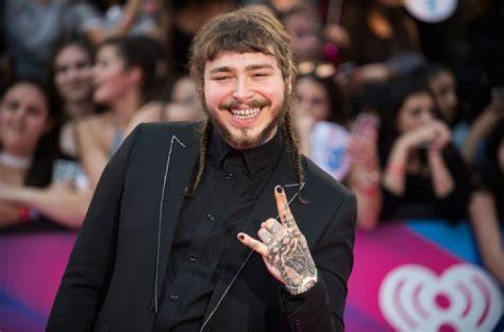 Post Malone Profiled in &lsquo;Rolling Stone,&rsquo; Talks Guns, &lsquo;SuperReligious