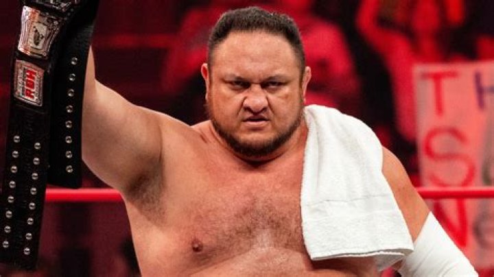 Samoa Joe cuts a promo about AJ Styles being a horrible Dad Cageside