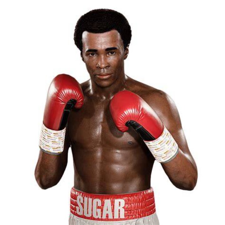 Sugar Ray Leonard Hands Out Christmas Gifts At Kids Party