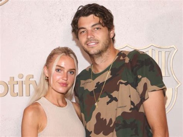 Taylor Fritz with wife and son celebrating his maiden title in
