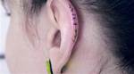 This New Tiny Ear Tattoo Fad Makes Hiding Body Art from Mom So Easy