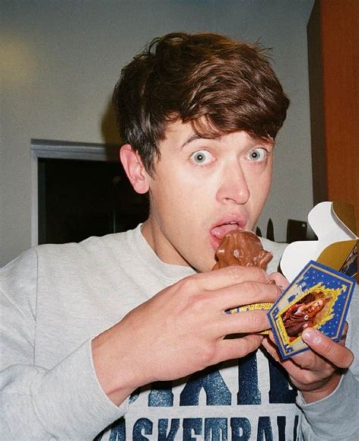 Tom Blyth eating chocolate on Easter