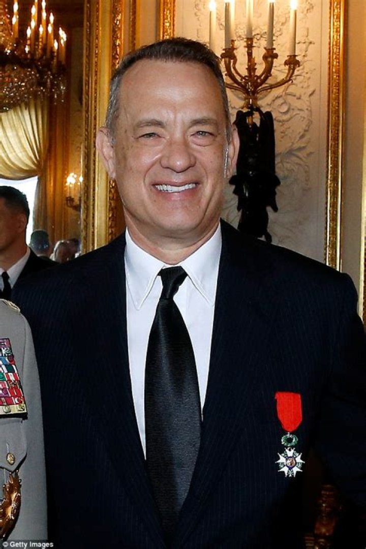 Tom Hanks receives Legion d'Honneur Medal in Paris with his family