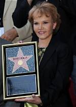 Who Is Maria Elena Holly? Wiki, Height, Husband, Net Worth
