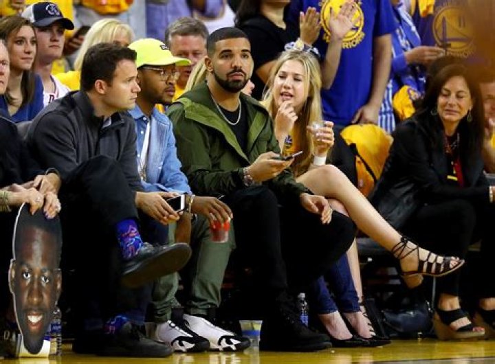 Who was sitting courtside at the Warriors&rsquo; home opener?